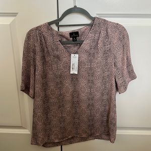 Worthington size small v neck short sleeve pink snakeskin print blouse.